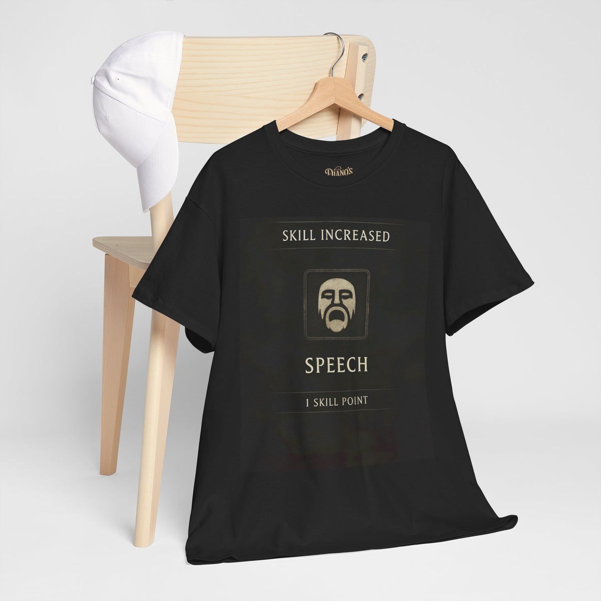 T-shirt with pixel NPC face graphic and 'Skill Increased — Speech — 1 Skill Point' text